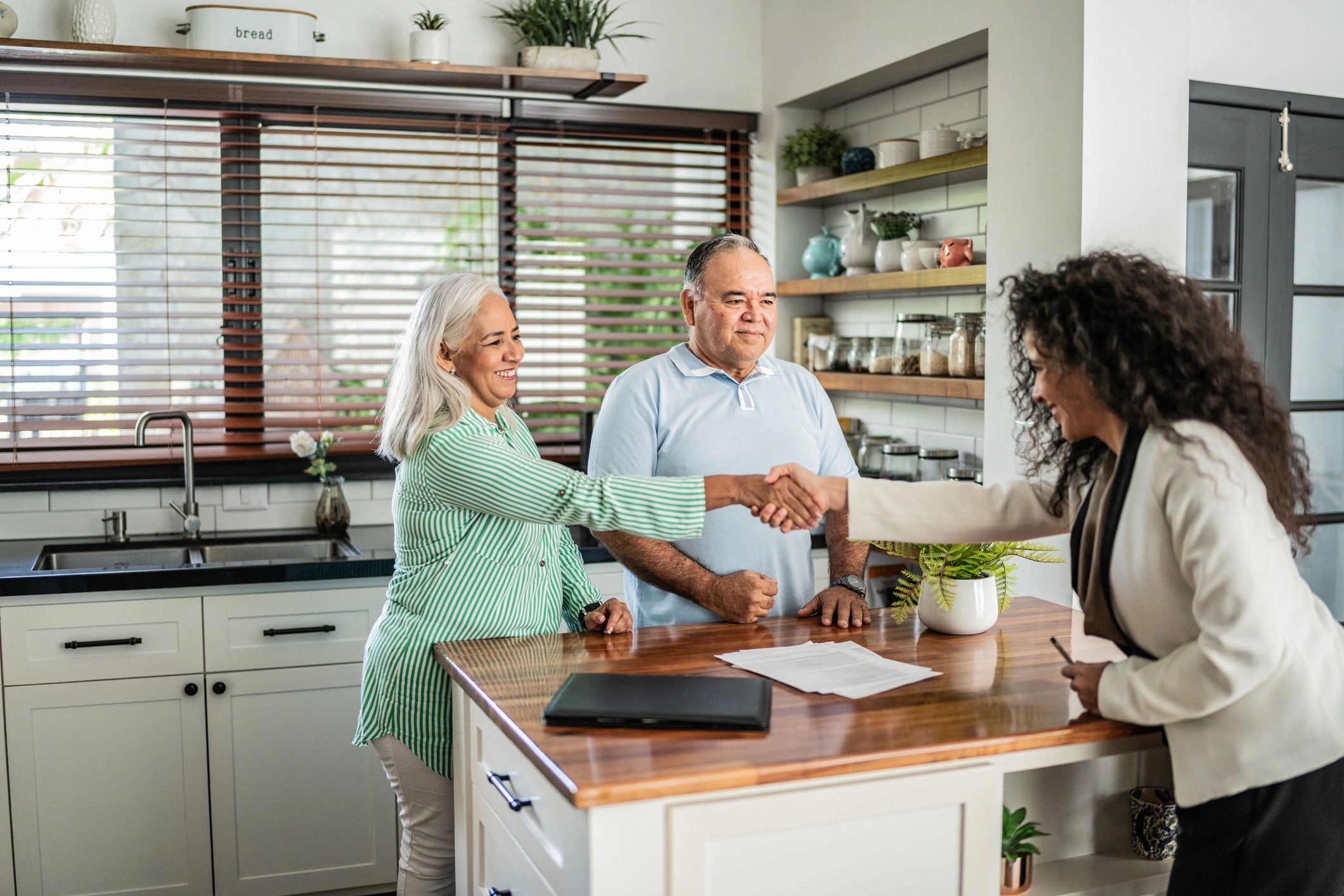 happy clients receiving mortgage approval