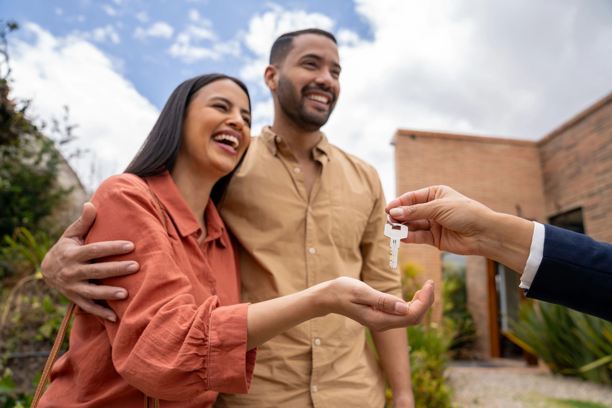 happy clients receiving mortgage approval