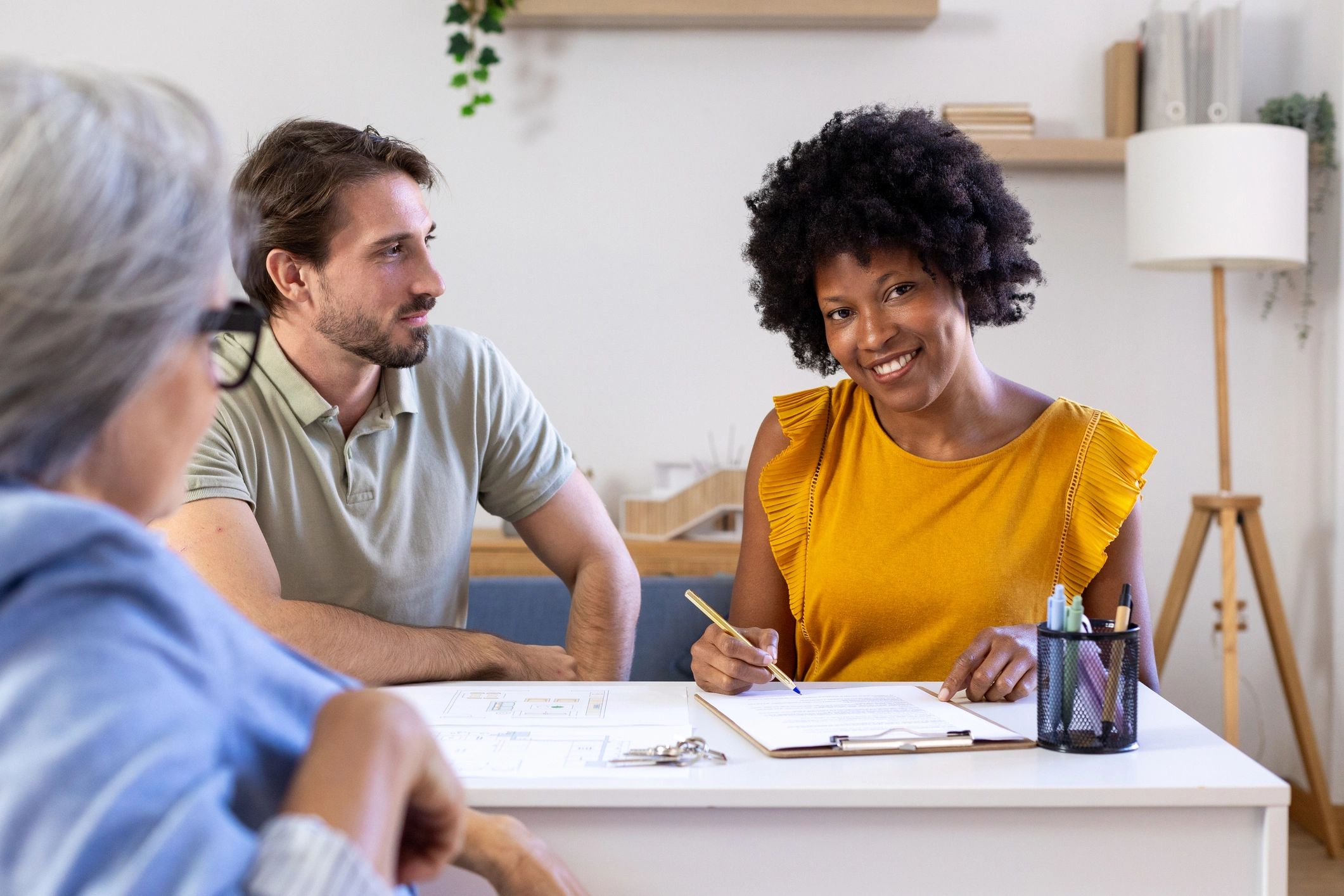 professional mortgage broker meeting client modern office